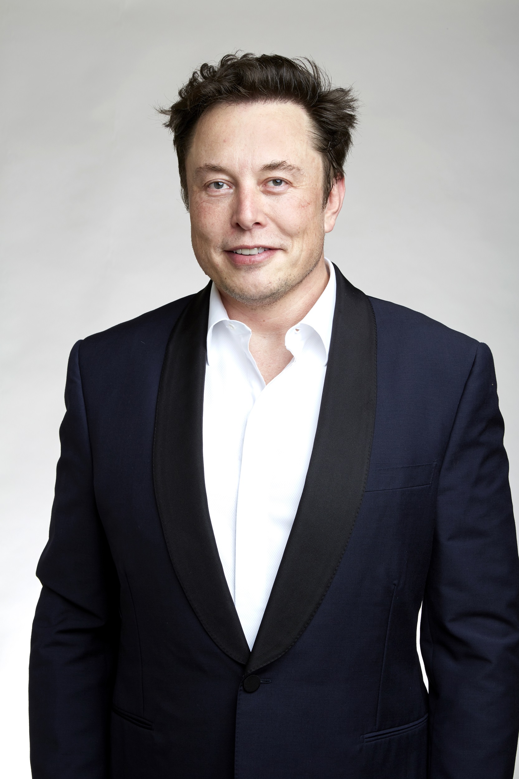 Photo of Elon Musk in a dinner jacket, used as the page mark. Not an endorsement.